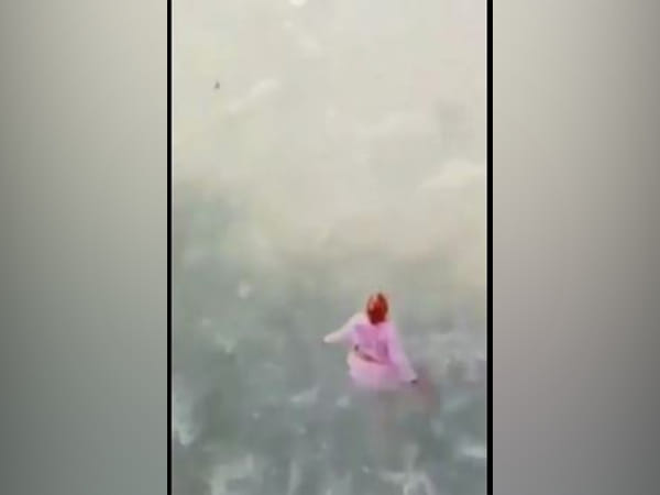Viral video: Elderly woman dives into Ganga river from bridge, Twitterati calls her 