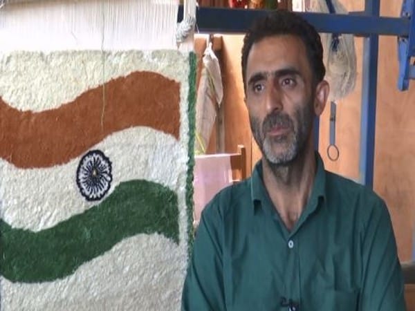 J-K: Kashmir-based artisan makes first carpet with national flag design in valley