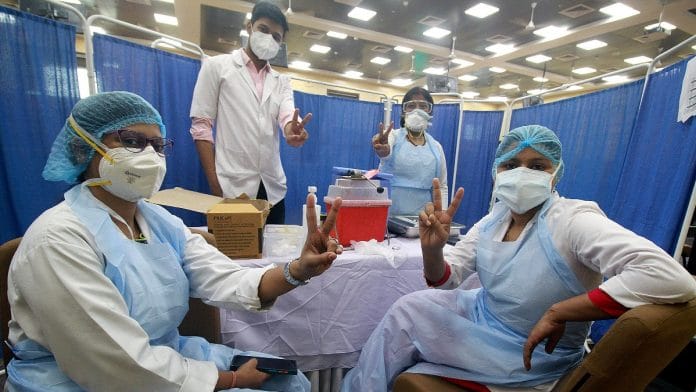 Nurses flashing victory sign on International Nursing Day on 12 May 2021 | ANI