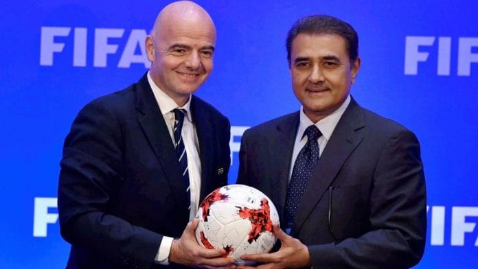 File photo of former AIFF chief Praful Patel with FIFA president Gianni Infantino | PTI