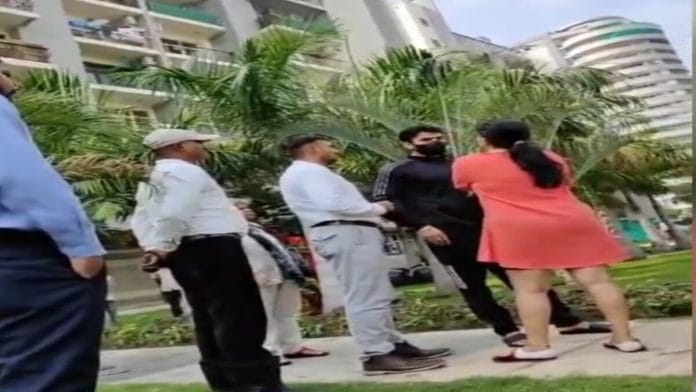 This screenshot of a viral vide shows BJP leader Shrikant Tyagi arguing with a woman