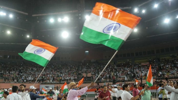 People holding the Tricolour during the ‘Tiranga Utsav’ event, on 2 August 2022 | Suraj Singh Bisht | ThePrint