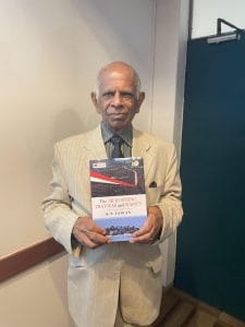 Author and former diplomat K.P. Fabian poses with his book at the book discussion on 17 August at India International Centre, New Delhi | Gaurvi Narang | ThePrint
