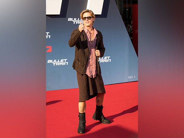 Brad Pitt reacts to his viral skirt look from 'Bullet Train' premiere
