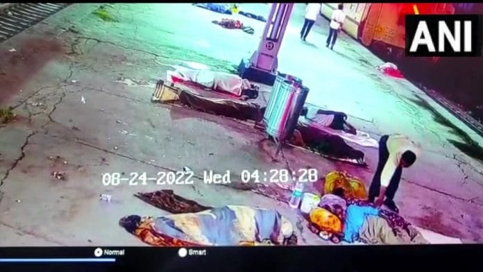 Screengarb of the CCTV footage where a man can be seen lifting the baby from the Mathura railway station | Twitter/@ANI