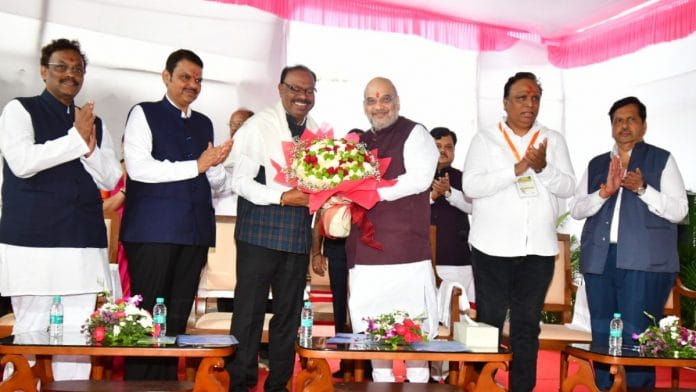 Union Home Minister Amit Shah with Maharashtra Deputy CM Devendra Fadnavis and senior BJP leaders at a meeting with party MPs, MLAs and corporators Monday in Mumbai | Twitter | @AmitShah