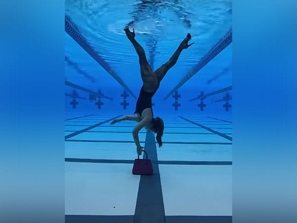 Video of woman walking upside down inside swimming pool leaves netizens amazed
