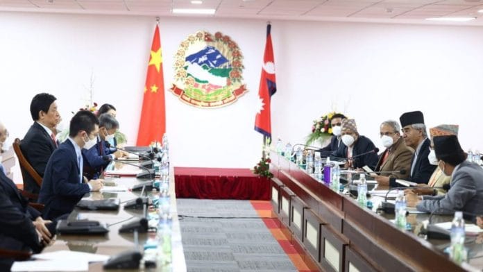 Li Zhanshu (L) meeting Nepalese PM Sher Bahadur Deuba (R) at the latter's office in Kathmandu | Source: Twitter/@SherBDeuba