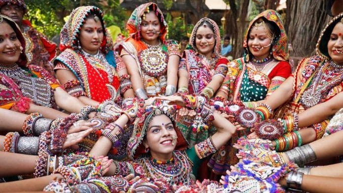 Artistes dressed up in traditional attire perform garba in Ahmedabad | ANI