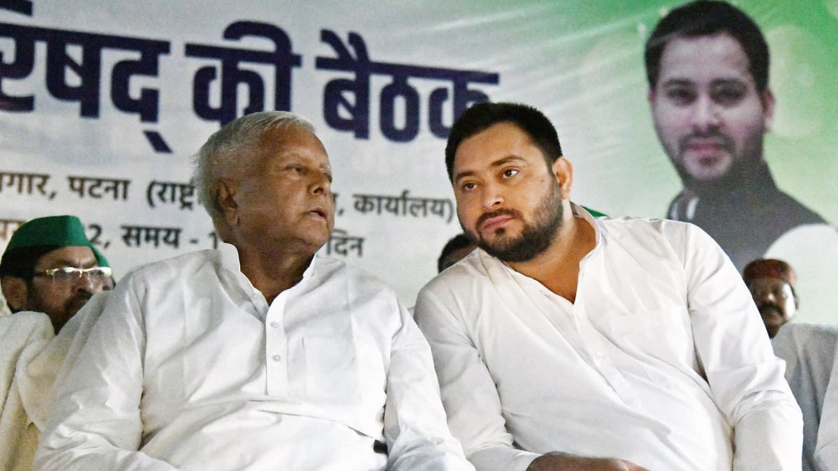Lalu Prasad Yadav with son Tejashwi during RJD state council meeting in Patna on 21 September, 2022 | ANI