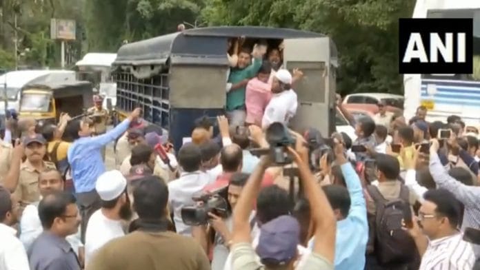 PFI protestors detained by Pune police Friday | Twitter / @ANI