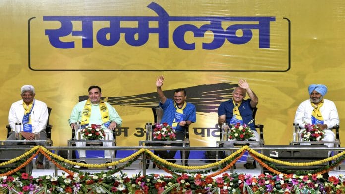 Delhi CM Arvind Kejriwal, Deputy CM Manish Sisodia wave at the crowd during the first Rashtriya Jan Pratinidhi Sammelan at Indira Gandhi Indoor Stadium, Delhi Sunday | ANI