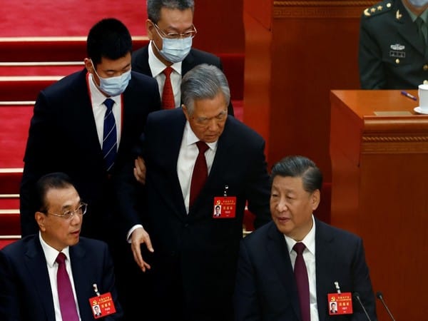 Former Chinese president Hu Jintao mysteriously escorted out in front of Xi Jinping