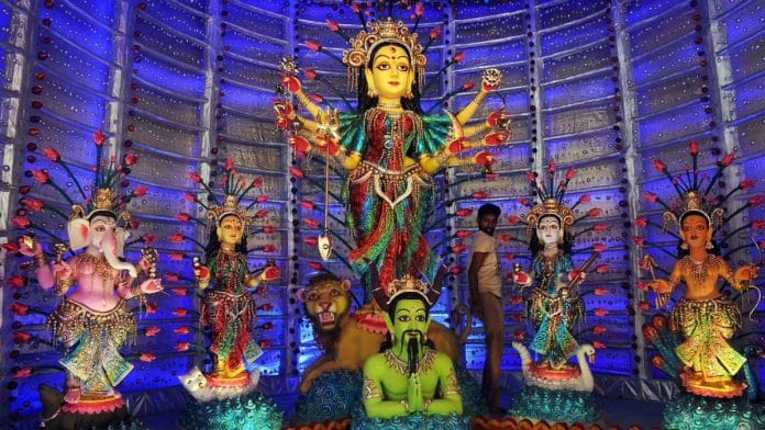 A pandal with a clay idol of Hindu goddess Durga in Chinese-inspired art | Dibayangshu Sarkar/AFP/Getty