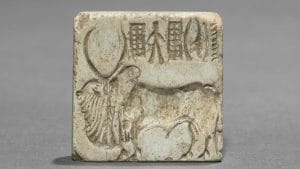 Seal with Two-Horned Bull and Inscription, Indus Valley civilization, Pakistan, c. 2000 BCE, Steatite. Image courtesy of the Cleveland Museum of Art.