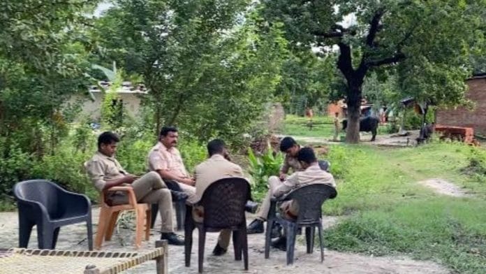 The police in Kandipur village in Ambedkar Nagar district in Uttar Pradesh | Credit: Shikha Salaria, ThePrint