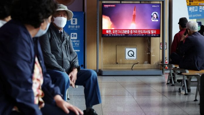People watch a TV broadcasting a news report on North Korea firing a ballistic missile over Japan, at a railway station in Seoul, South Korea on 4 October 2022 | Reuters/Kim Hong-Ji