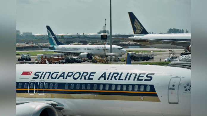 Singapore Airlines planes sit on the tarmac at Changi Airport in Singapore on 16 November, 2021 | Reuters File Photo /Caroline Chia