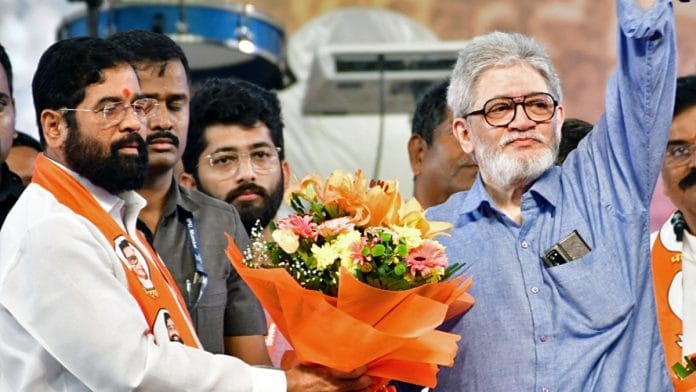 Balasaheb Thackeray's son Jaidev Thackeray shares the stage with Maharashtra CM Eknath Shinde during Dussehra rally at Mumbai's BKC ground on Wednesday| ANI