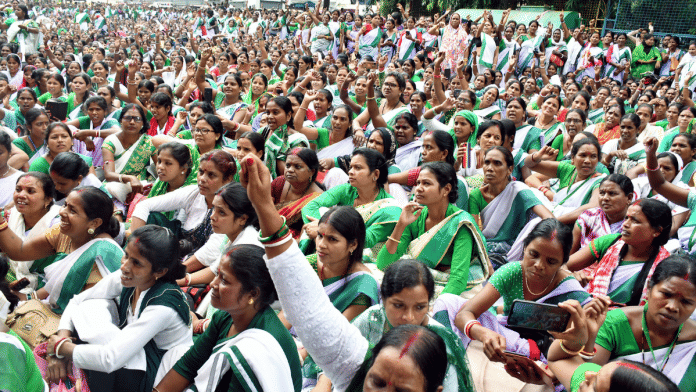 Anganwadi workers protest for better pay | Source: ANI