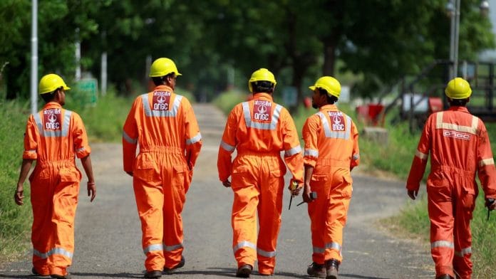 File photo: Technicians walking next inside a desalter plant of Oil and Natural Gas Corp (ONGC) on the outskirts of Ahmedabad, 30 September, 2016 | Reuters