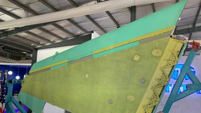 The first fuel-carrying, 9G-capable, interchangeable fighter wing of an F-16 aircraft manufactured in India by Tata Lockheed Martin joint venture, on display at the DefExpo | Photo: Snehesh Alex Philip | ThePrint