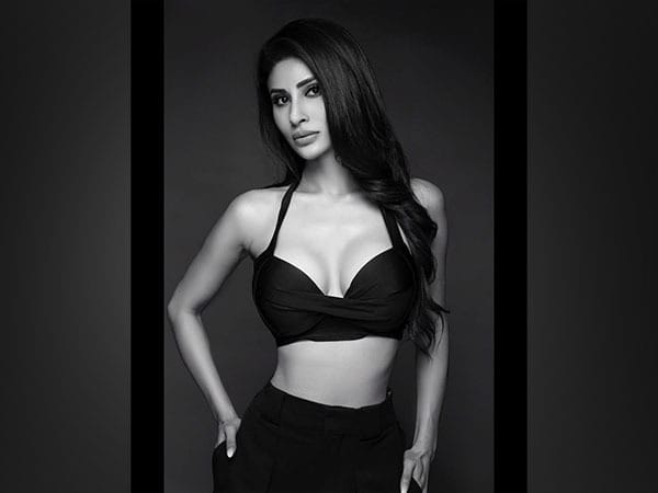 Mouni Roy raises temperature in white sleeveless top