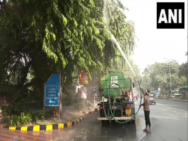 Delhi: Sprinkling of water done on roads, to check rise in AQI