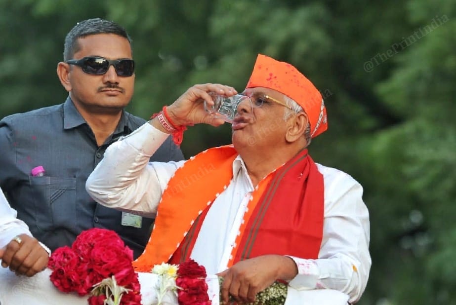 Gujarat CM drinking water during roadshow in Ahmedabad | Photo: Praveen Jain | ThePrint
