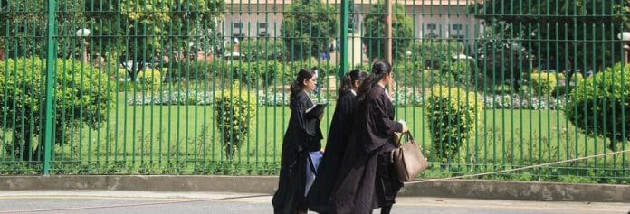 lawyers walking outside the Supreme Court