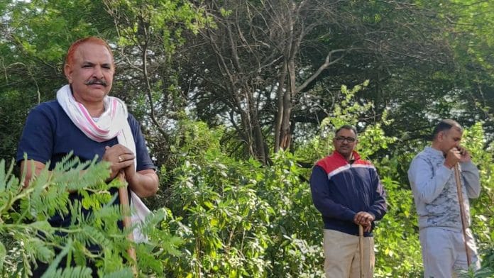Plain-clothes policemen stand guard at the Mehrauli jungle | Credit: Bismee Taskin