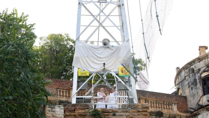 PM Narendra Modi with Gujarat Home Minister Harsh Sanghavi at the site to take stock of the situation after an old suspension bridge collapsed in Morbi district | PTI