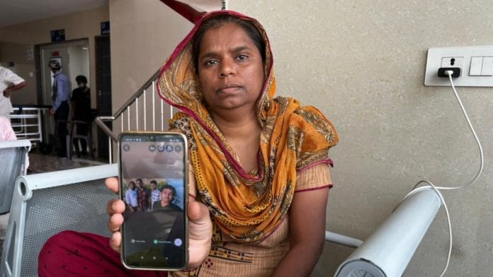 Gulshan Rathod shows a picture of her sons (the two boys in the centre). Both are currently being treated at a hospital | Credit: Soniya Agrawal, ThePrint