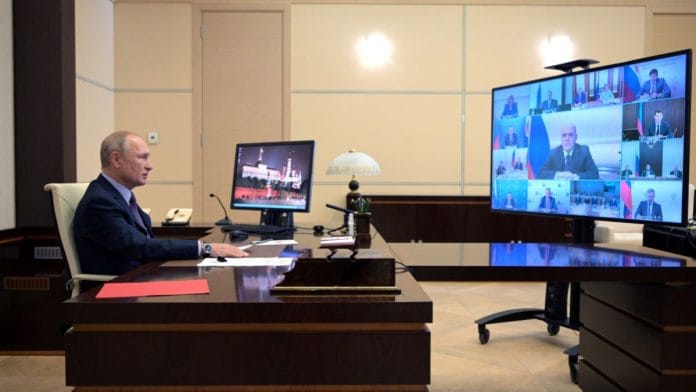 File photo of President Vladimir Putin attending a meeting on national projects via a video conference call at the Novo-Ogaryovo state residence outside Moscow on 13 July, 2022 | Reuters