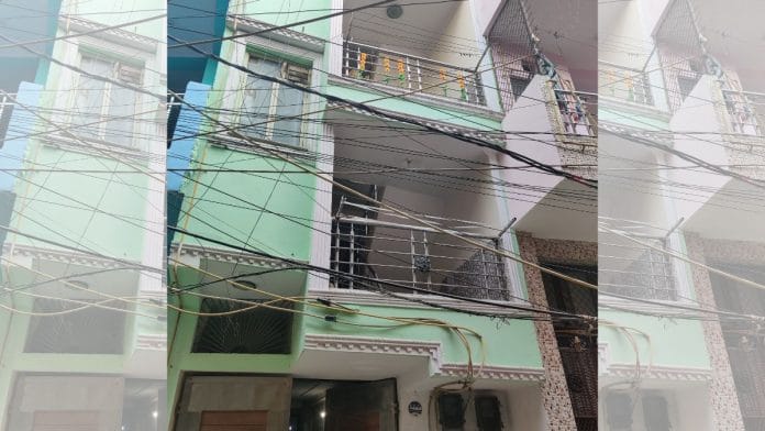 The building in Delhi's Chhatarpur where the couple lived | ThePrint photo | Bismee Taskin