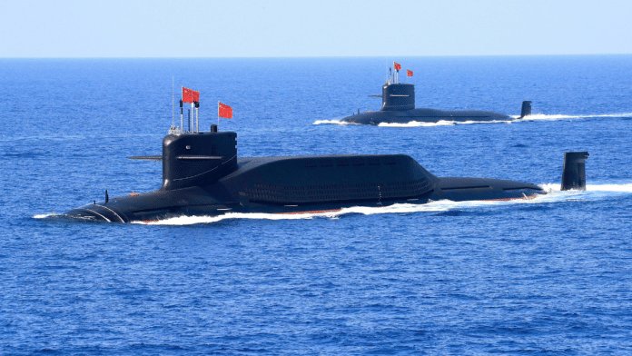 File photo: A nuclear-powered Type 094A Jin-class ballistic missile submarine of the Chinese People's Liberation Army (PLA) Navy during a military display in the South China Sea on 12 April, 2018 | Reuters
