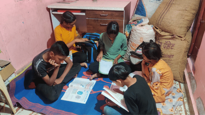 Group of students gather for a study session every day at 7pm at Vadgaon | Purva Chitnis/ThePrint
