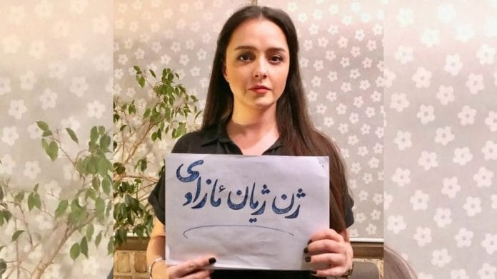 An image obtained from social media shows Taraneh Alidoosti posing with her hair uncovered to express support for nationwide anti-government protests, in this image released on 9 November | Taraneh Alidoosti's Instagram via Reuters