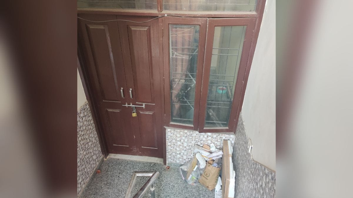The locked doors of the flat where the couple resided| ThePrint photo | Bismee Taskin