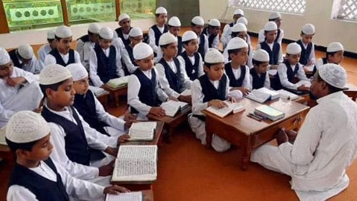 Children studying in a madrasa | Representational image | PTI