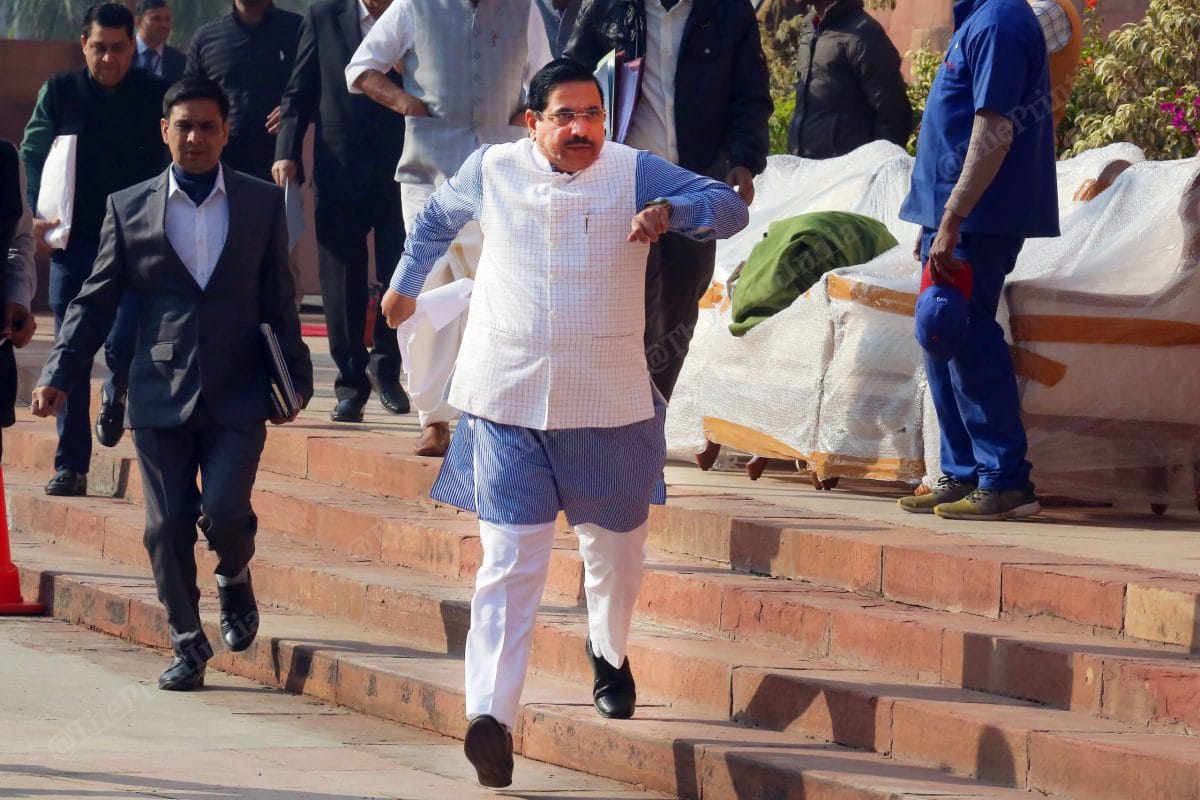Pralhad Joshi, Minister of Parliamentary Affairs of India, hurries to officiate Vice President | Photo: Praveen Jain | ThePrint