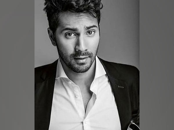 Varun Dhawan flaunts muscular physique as he bids 