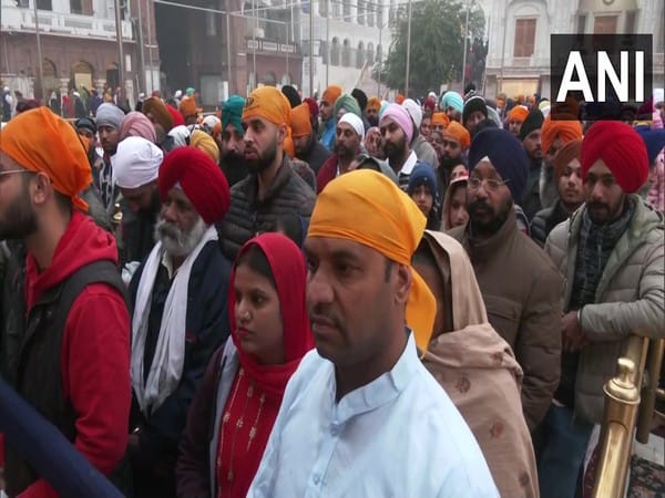 Devotees offer prayers at Golden temple in Amritsar on Guru Gobind Singh Jayanti  