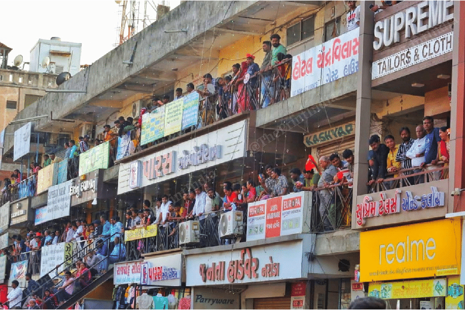 Locals coming out of their homes and shops to witness the roadshow | Photo: Praveen Jain | ThePrint
