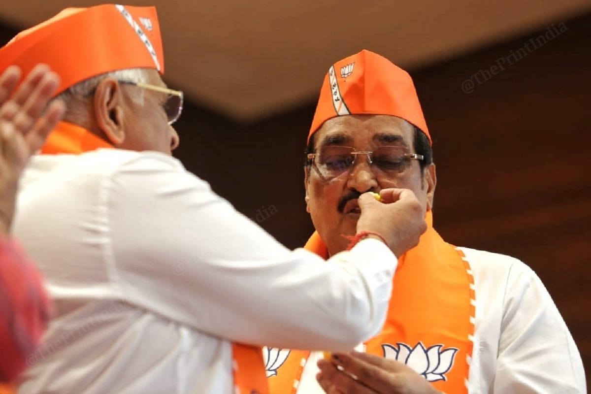 CM Patel offers a sweet to member of Parliament and chief of the BJP's Gujarat unit, C.R. Patil | Photo: Praveen Jain | ThePrint