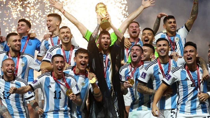 Argentina's Lionel Messi receives the trophy from the FIFA president Gianni Infantino during the trophy presentation | Reuters/Dylan Martinez