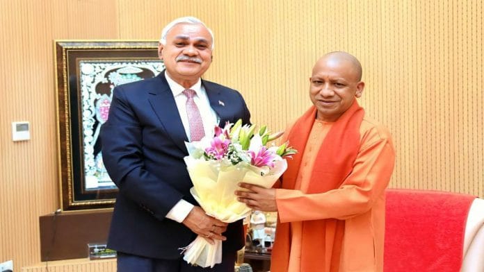 UP chief minister Yogi Adityanath (right) with chief secretary D.S. Mishra. | Twitter: @ChiefSecyUP