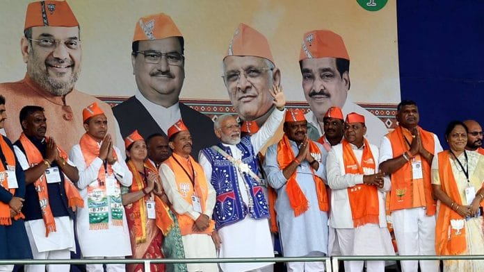 File photo of Prime Minister Narendra Modi and other BJP leaders greeting supporters during a public meeting in Dahod | ANI 