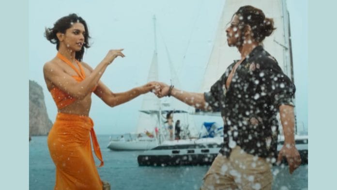 Screen grab from Pathaan music video 'Besharam Rang', featuring Deepika Padukone & Shah Rukh Khan | Youtube/@YRF