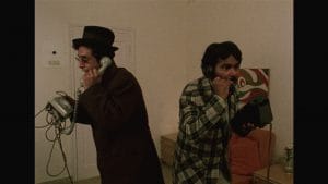 Naseerudin Shah and Satish Kaushik in a still from Jaane Bhi Do Yaaron | YouTube screengrab